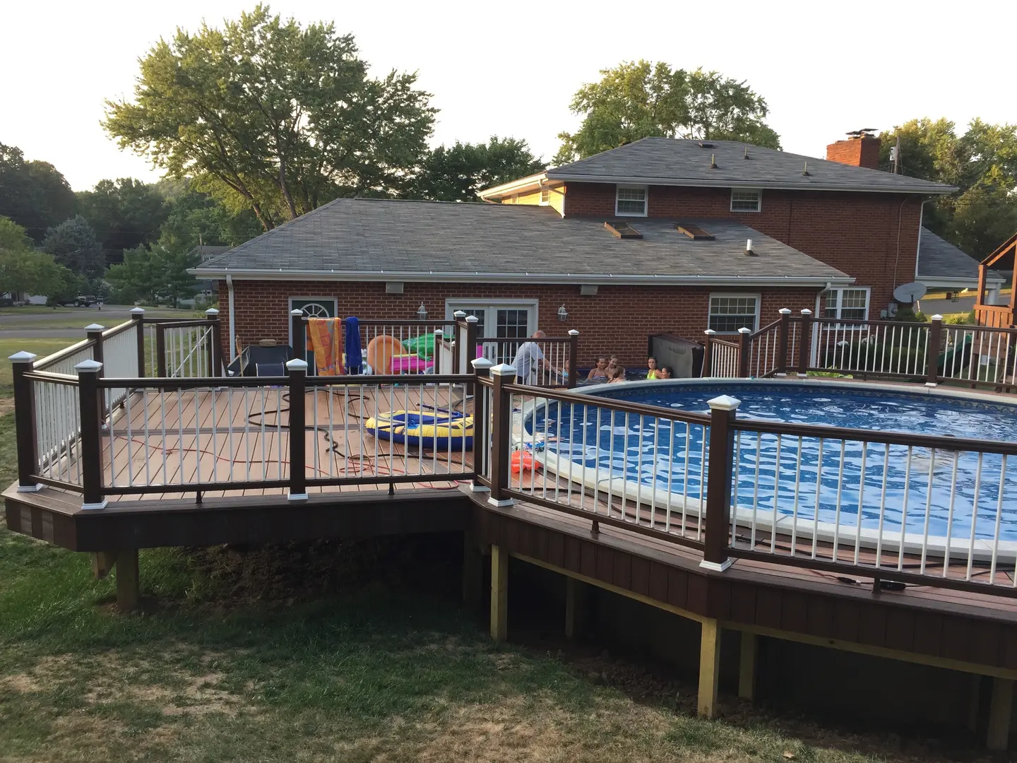 A pool with people standing around it